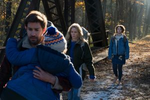 Left to right: Noah Jupe plays Marcus Abbott, John Krasinski plays Lee Abbott, Emily Blunt plays Evelyn Abbott and Millicent Simmonds plays Regan Abbott in A QUIET PLACE.