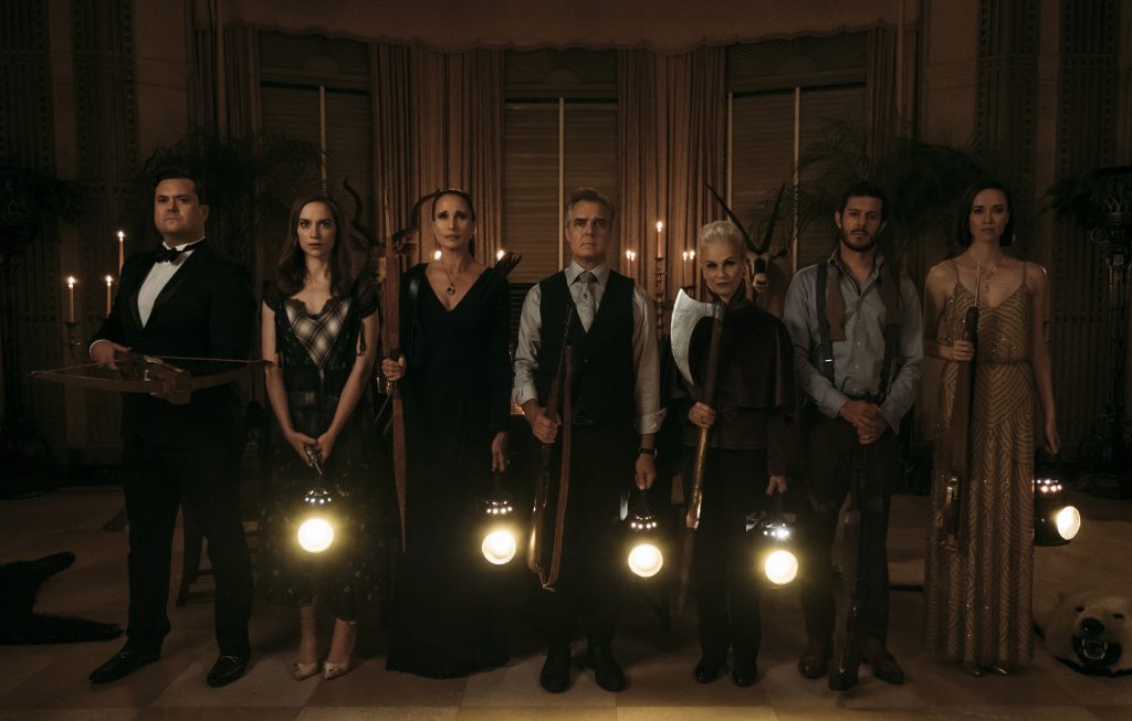 (L to R) Kristian Bruun, Melanie Scrofano, Andie MacDowell, Henry Czerny, Nicky Guadagni, Adam Brody, and Elyse Levesque in the film Ready or Not