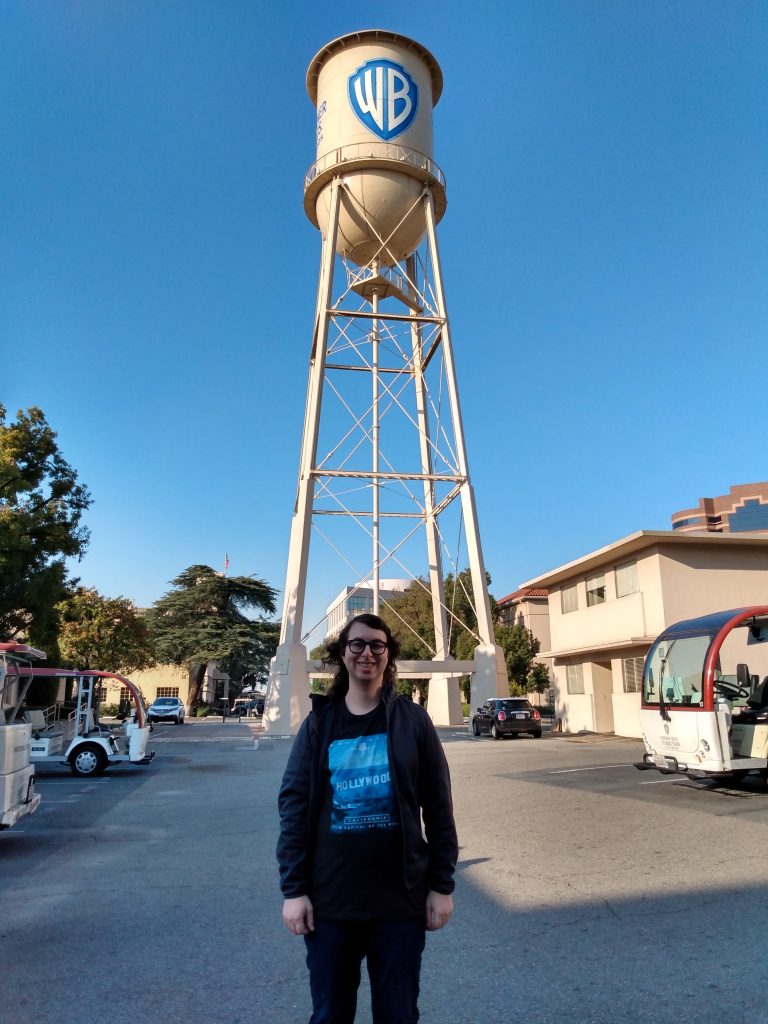 Danielle Solzman poses in front of the iconic Warner Brothers water tower, which plays home to the Animaniacs.