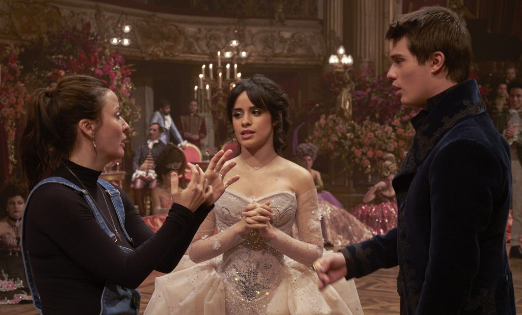 Kay Cannon with Camila Cabello and Nicholas Galitzine on the set of Cinderella.