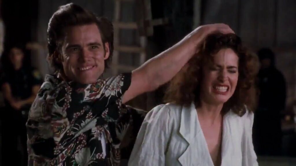 Jim Carrey and Sean Young in Ace Ventura: Pet Detective