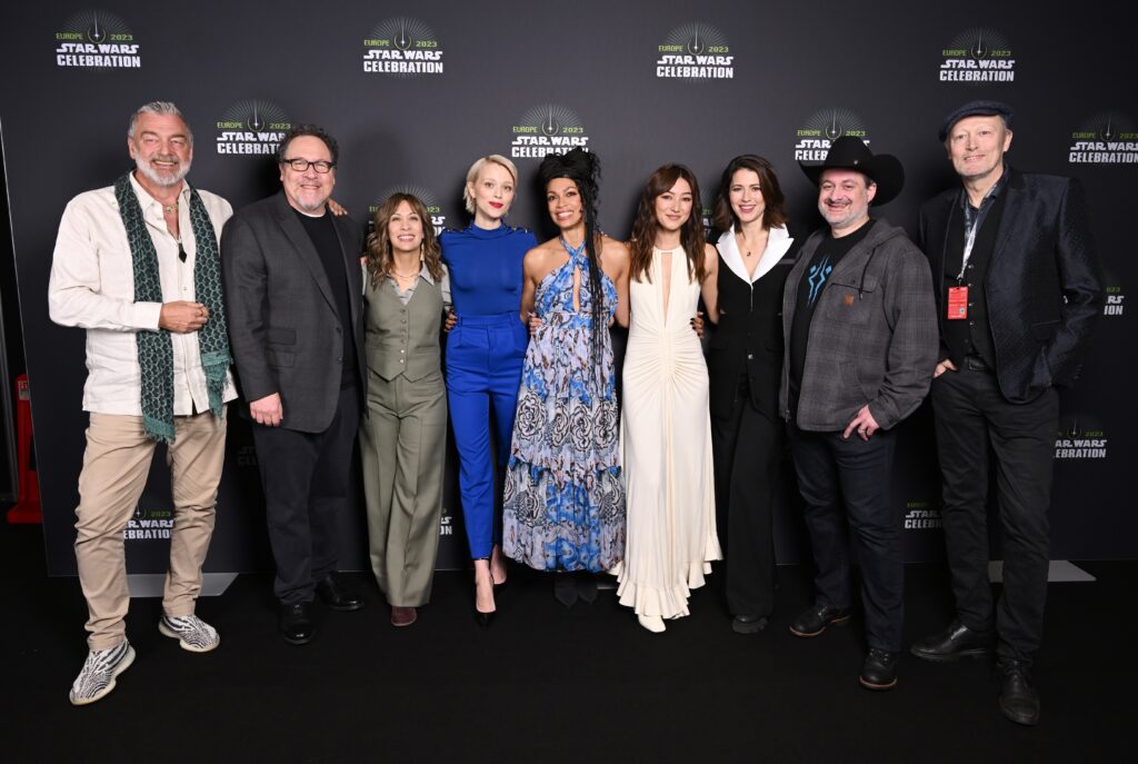 Ray Stevenson, Jon Favreau, Diana Lee Inosanto, Ivanna Sakhno, Rosario Dawson, Natasha Liu Bordizzo, Mary Elizabeth Winstead, Dave Filoni and Lars Mikkelsen attend the Ahsoka panel at Start Wars Celebration 2023 in London