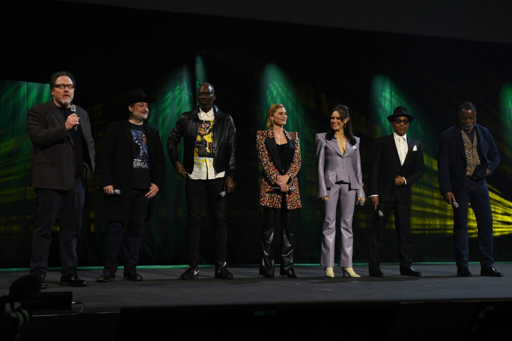 Jon Favreau, Dave Filoni, Rick Famuyiwa, Katee Sackhoff, Emily Swallow, Giancarlo Esposito, and Carl Weathers onstage during a special screening of 'The Mandalorian' at the studio panel at the Star Wars Celebration 2023 in London