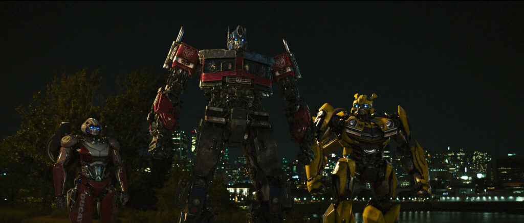 Arcee, Optimus Prime and Bumblebee in Transformers: Rise of the Beasts.