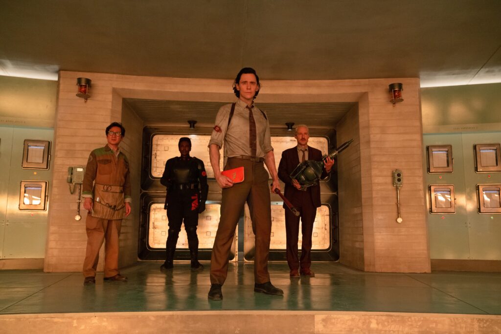 (L-R): Ke Huy Quan as O.B., Wunmi Mosaku as Hunter B-15, Tom Hiddleston as Loki, and Owen Wilson as Mobius in LOKI.