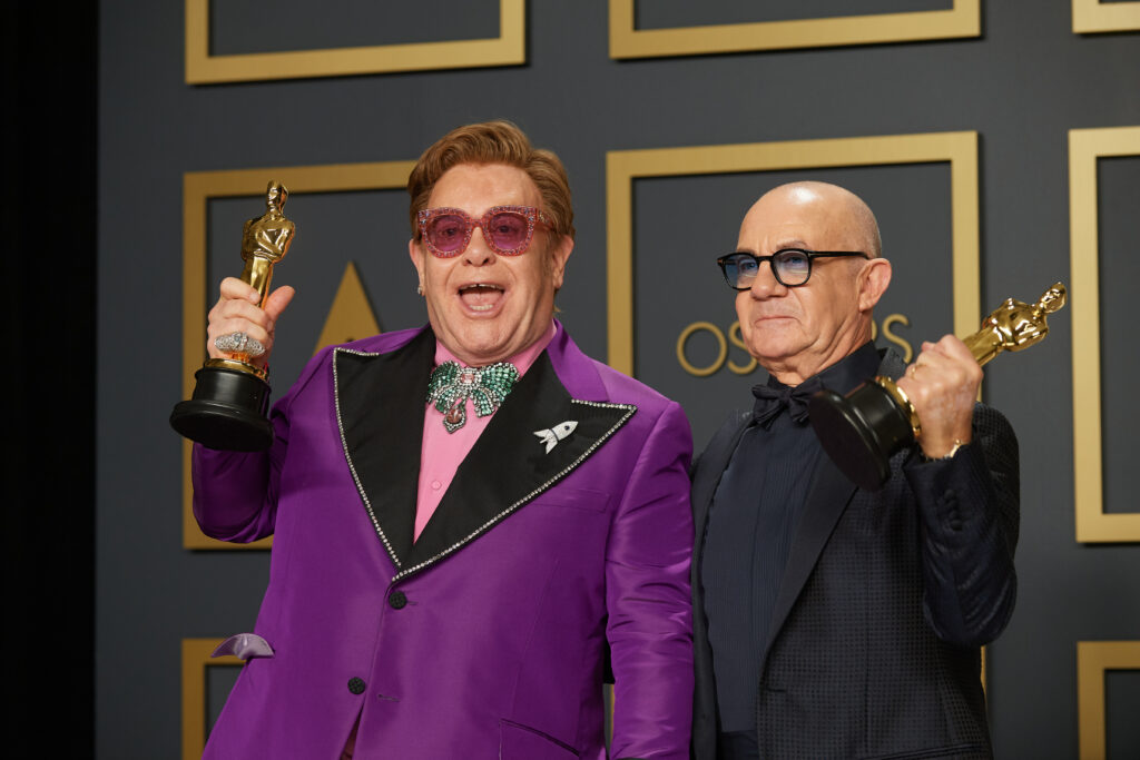 Elton John and Bernie Taupin pose backstage with the Oscar for Original Song during the live ABC Telecast of The 92nd Oscars at the Dolby Theatre in Hollywood, CA on Sunday, February 9, 2020.