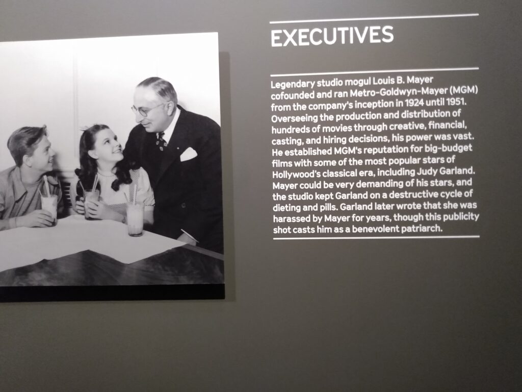 A plaque describing Louis B. Mayer and MGM on display at The Wizard of Oz exhibit at the Academy Museum of Motion Pictures in 2021.