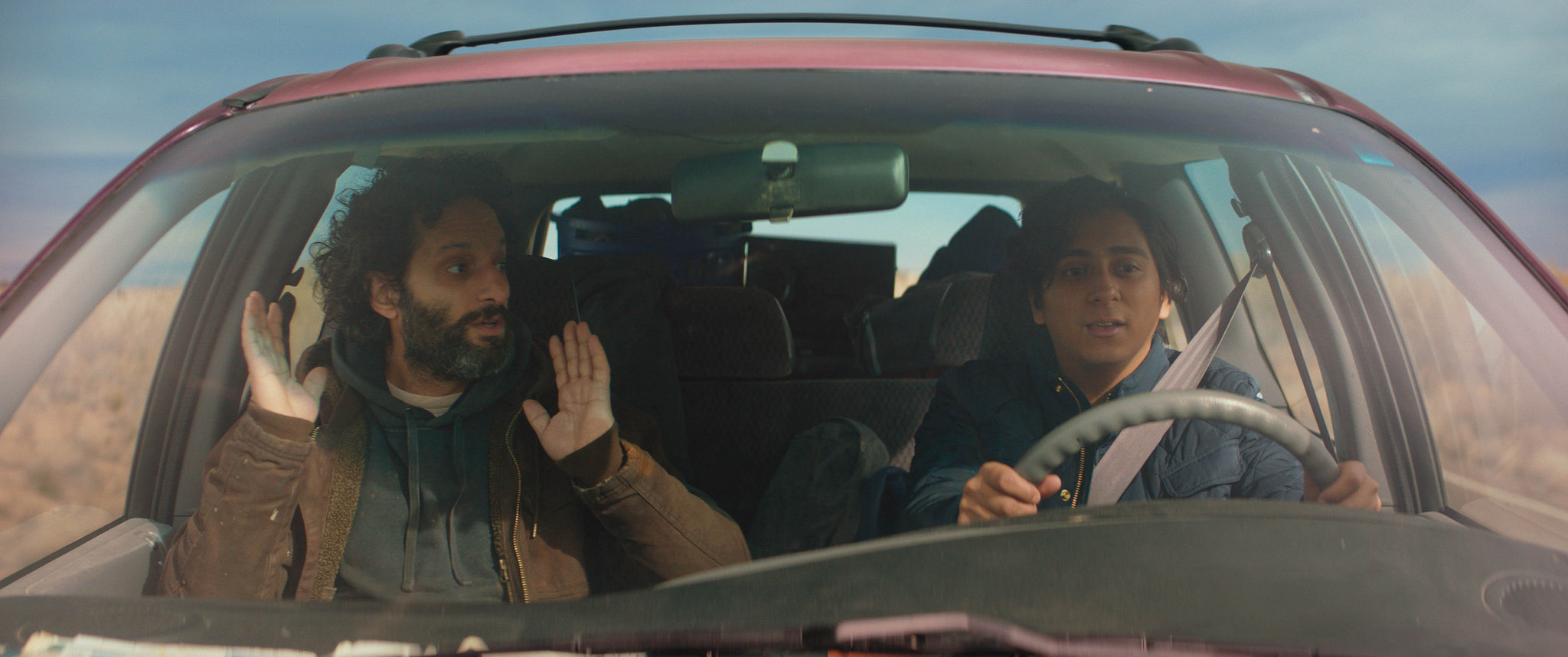 Jason Mantzoukas and Tony Revolori in The Long Dumb Road.