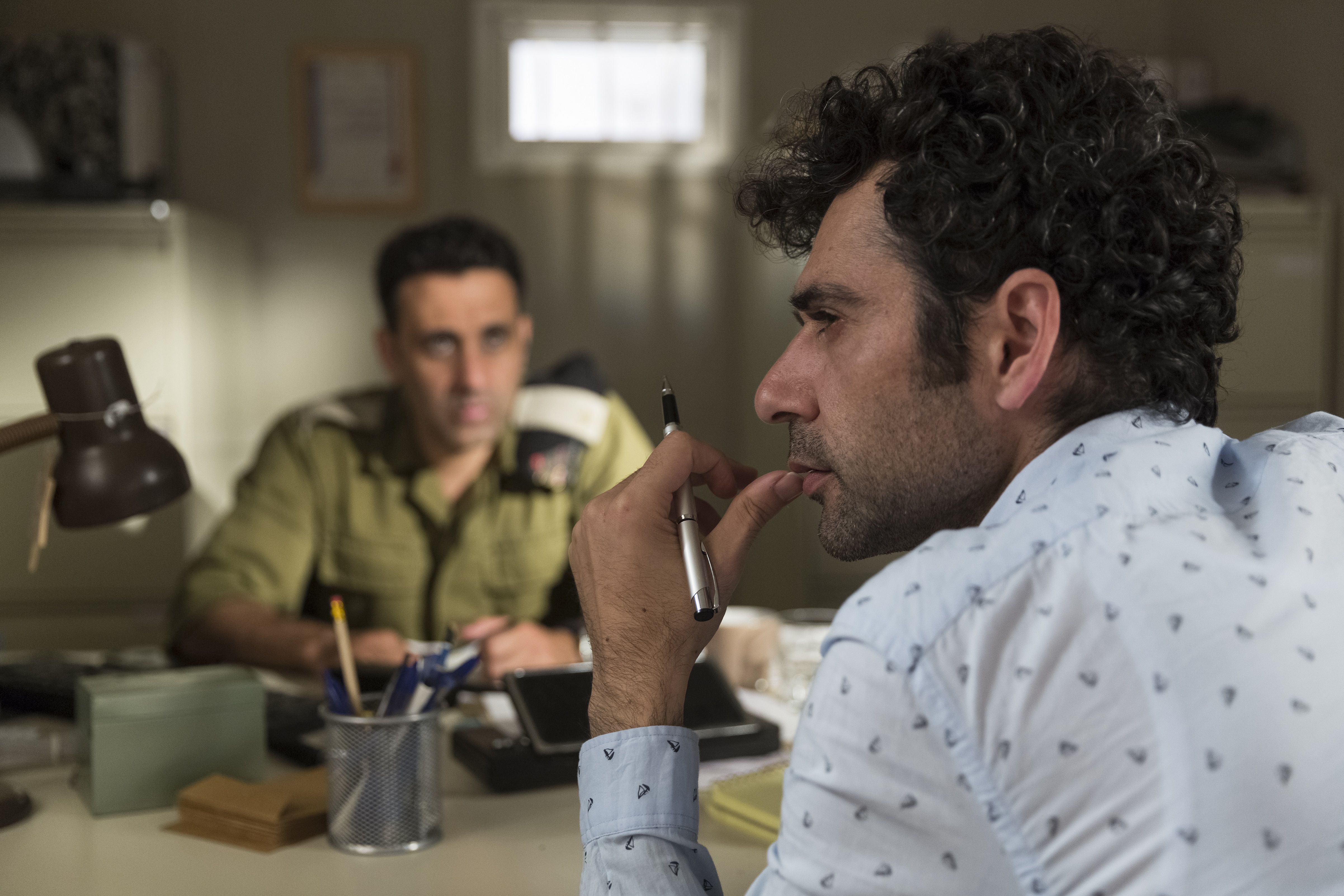 Yaniv Biton as “Assi” (left) and Kais Nashif as “Salam” (right) in TEL AVIV ON FIRE directed by Sameh Zoabi.