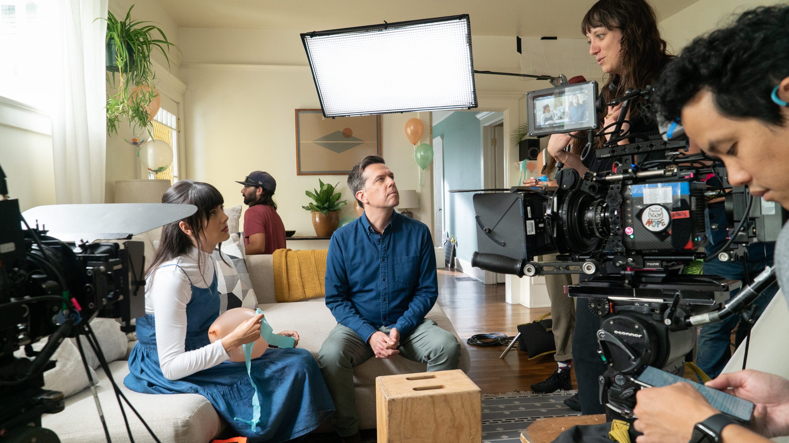 Patti Harrison, Ed Helms, and Nikole Beckwith on set of Together Together