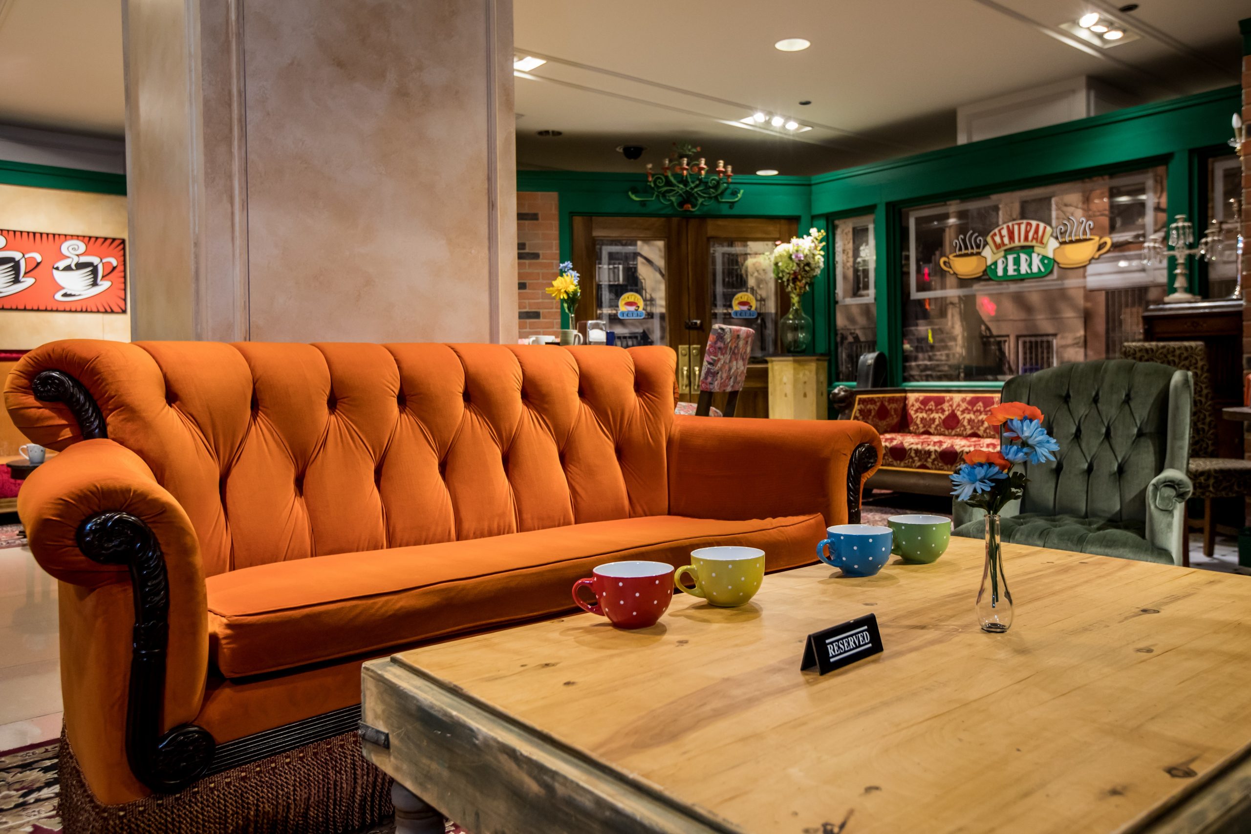 Central Perk Coffee Shop Orange Couch at The Friends Experience