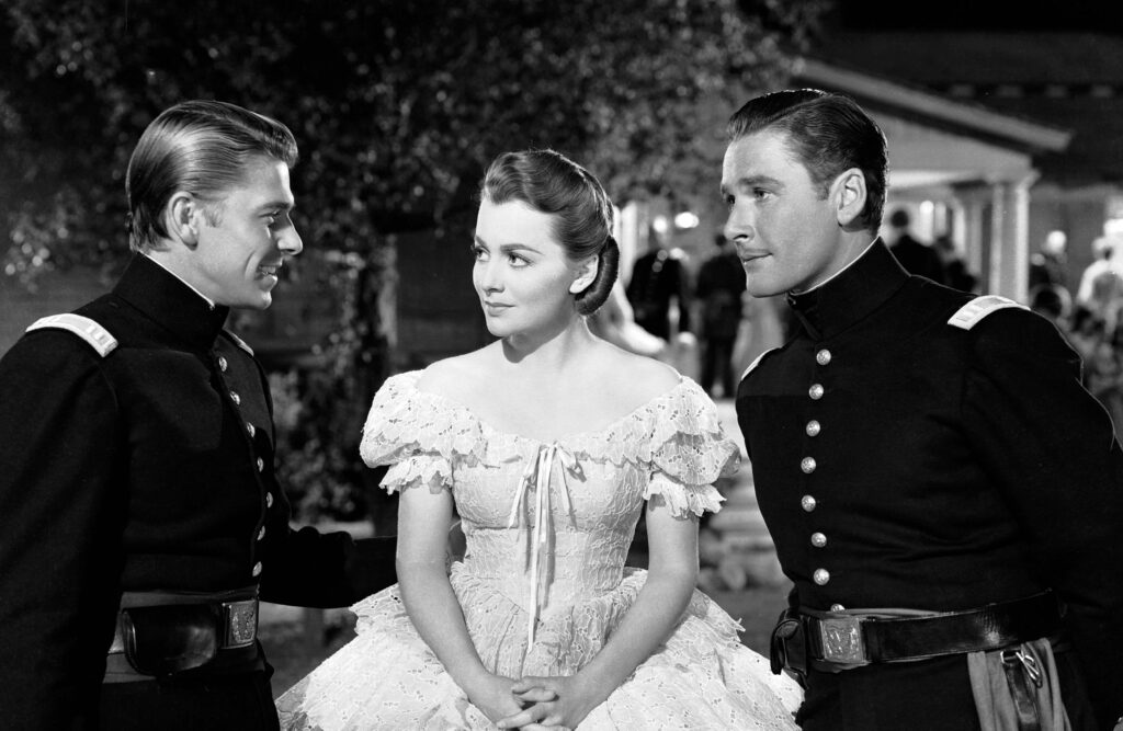Ronald Reagan, Olivia De Havilland, and Errol Flynn in Santa Fe Trail.