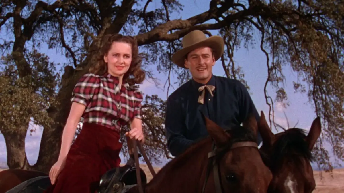 Olivia de Havilland and Errol Flynn in Dodge City.