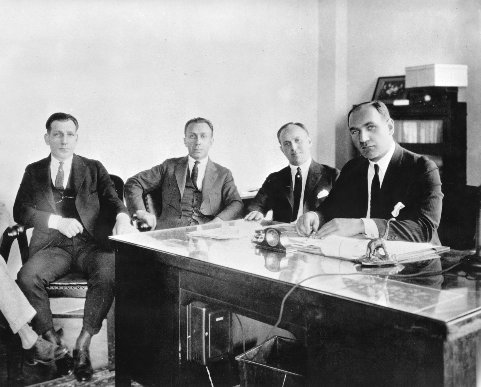 Full publicity shot of the four Warner brothers in 1922. From left: Sam Warner, Harry Warner, Jack L. Warner, and Albert Warner. aka Warner Bros., The Warner Brothers, The Brothers Warner