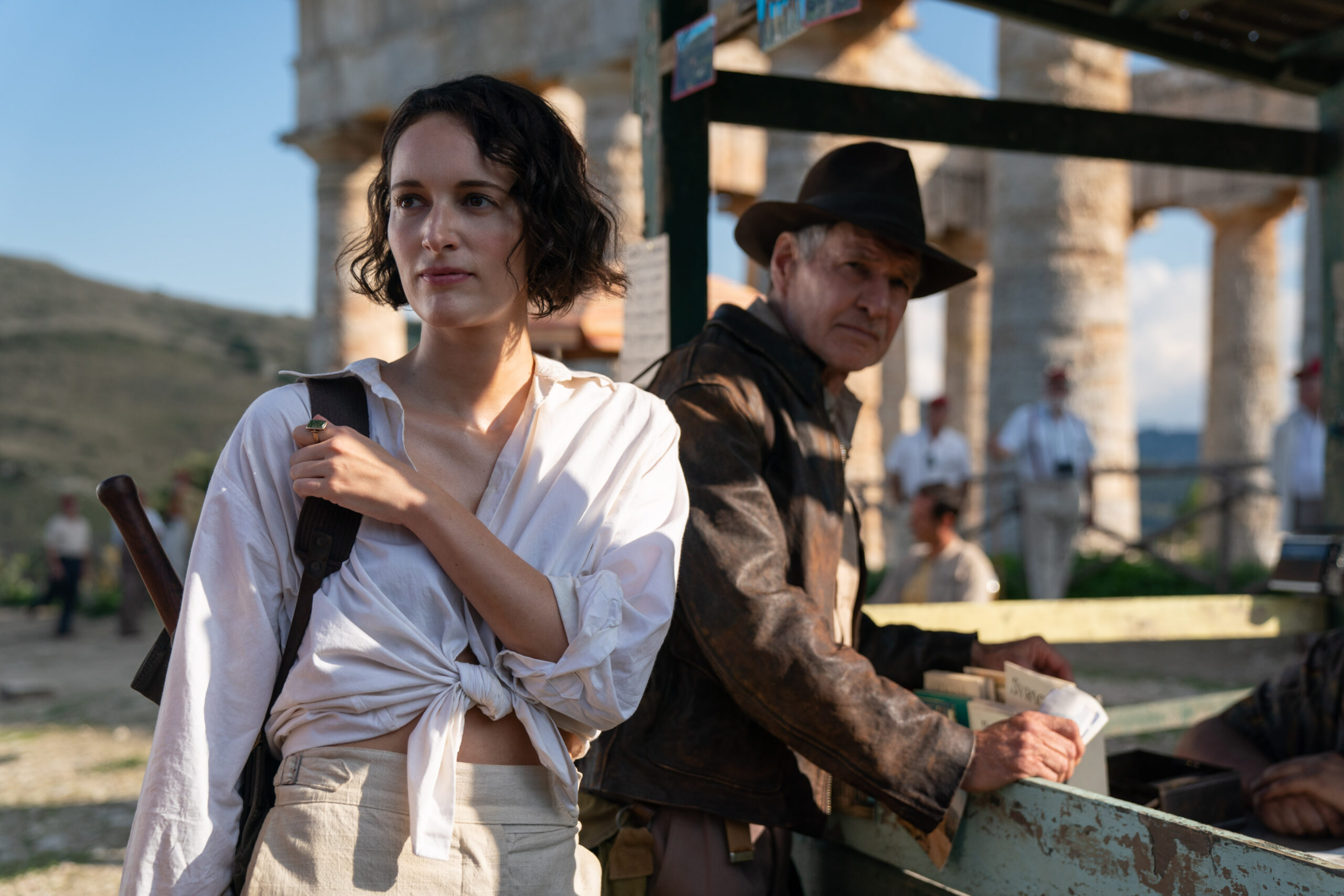 (L-R): Helena (Phoebe Waller-Bridge) and Indiana Jones (Harrison Ford) in Lucasfilm's Indiana Jones and the Dial of Destiny.