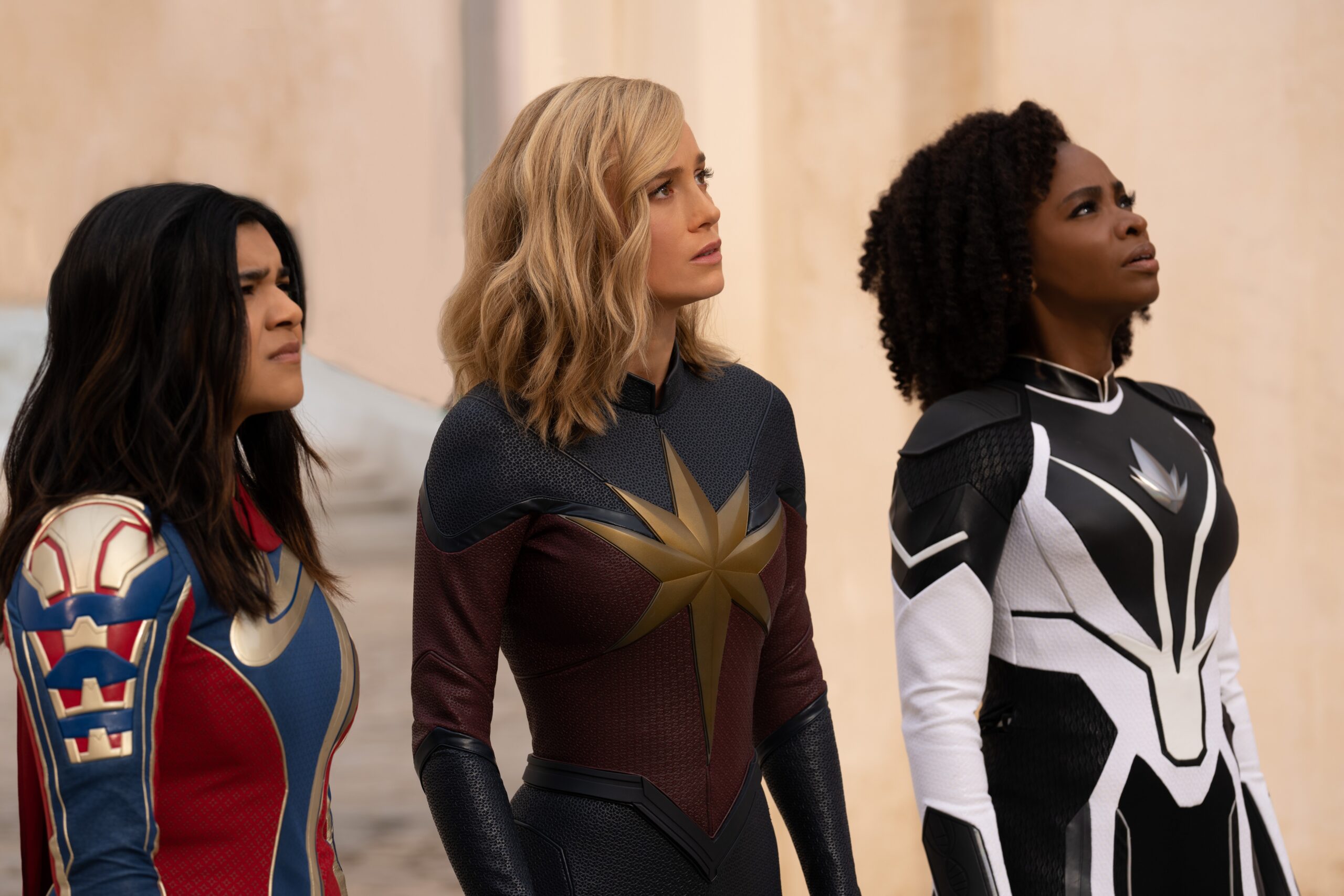 (L-R): Iman Vellani as Ms. Marvel/Kamala Khan, Brie Larson as Captain Marvel/Carol Danvers, and Teyonah Parris as Captain Monica Rambeau in The Marvels.