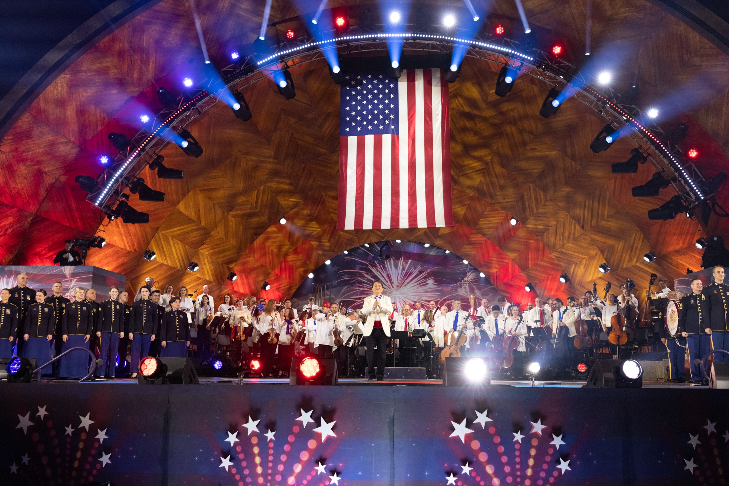 Keith Lockhart and Boston Pops Esplanade Orchestra with the whole ensemble at end of Stars and Stripes Forever during the annual 4th of July Boston Pops Fireworks Spectacular on July 4, 2023