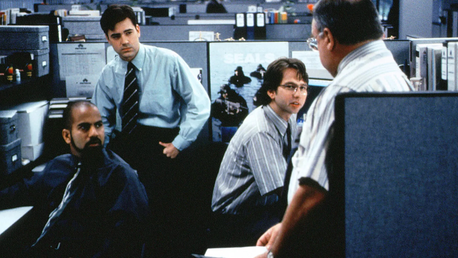 Ajay Naidu, Ron Livingston, David Herman, and Richard Riehle in Office Space.