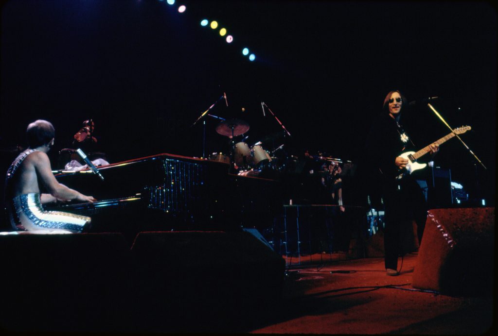 Elton is joined on stage at Madison Square Garden by his surprise guest, John Lennon, in 1974. This would be Lennon's final live concert performance before his death.