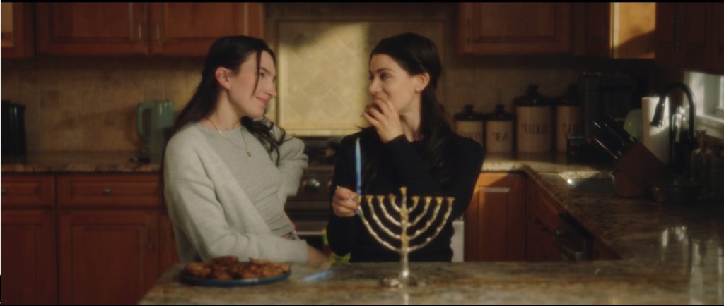 L-R: Allie (Jenna Harwood) and Gabby (Elyssa Nicole Trust) in Observance.