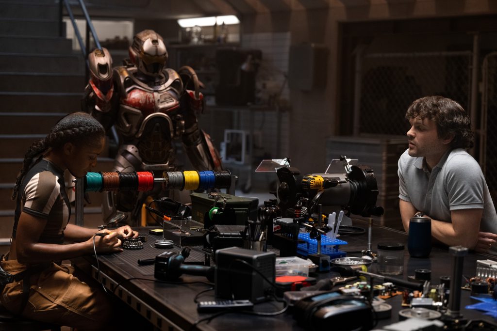 (L-R): Ironheart/Riri Williams (Dominique Thorne) and Joe McGillicuddy (Alden Ehrenreich) in Marvel Television's IRONHEART, exclusively on Disney+.