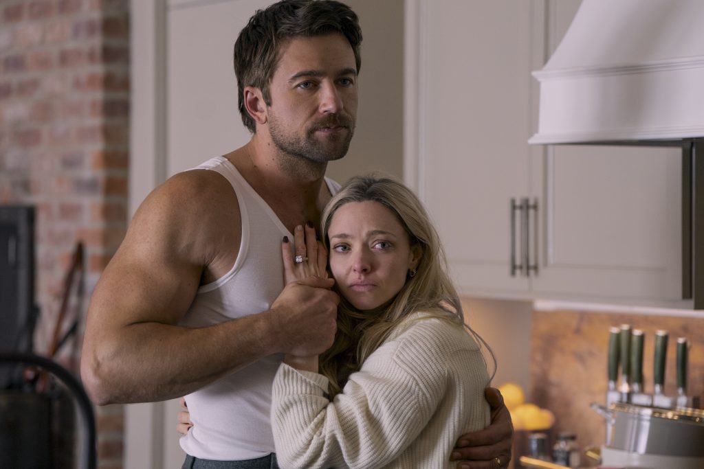 Brandon Sklenar as Andrew Winchester and Amanda Seyfried as Nina Winchester in The Housemaid.