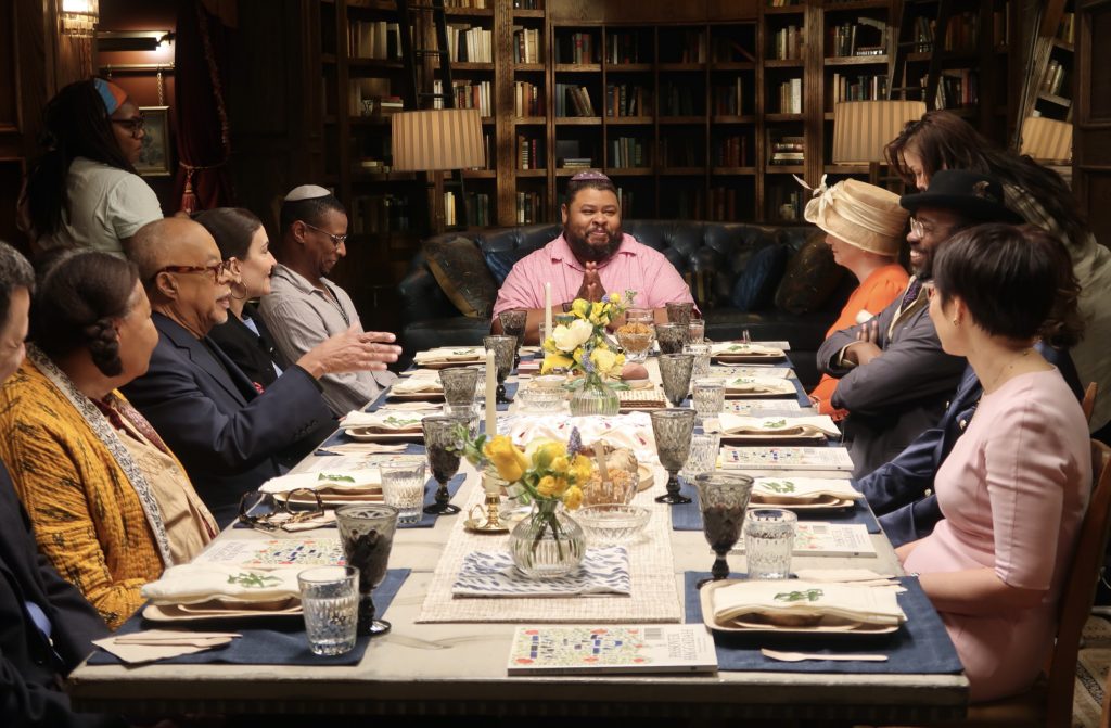 Henry Louis Gates Jr. and friends at a Jewish seder dinner in Black and Jewish America: An Interwoven History.