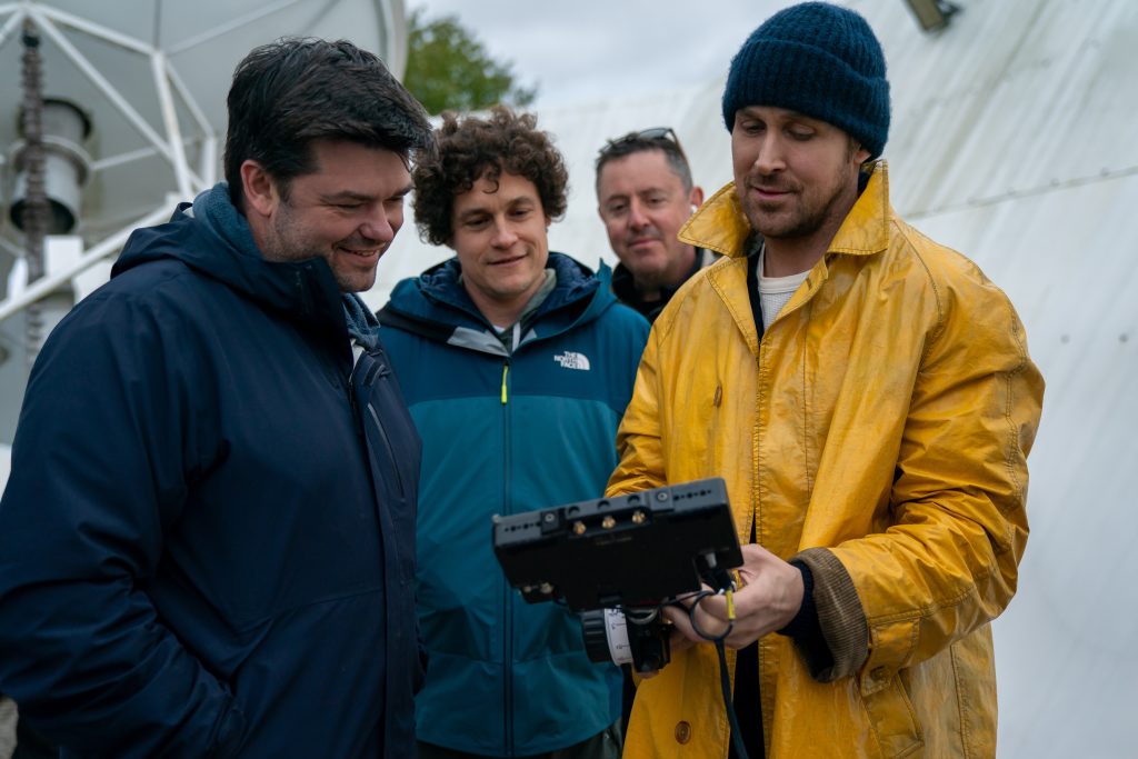(L to R) Directors Christopher Miller and Phil Lord with cinematographer Greig Fraser and actor Ryan Gosling on the set of their film PROJECT HAIL MARY, from Amazon MGM Studios.